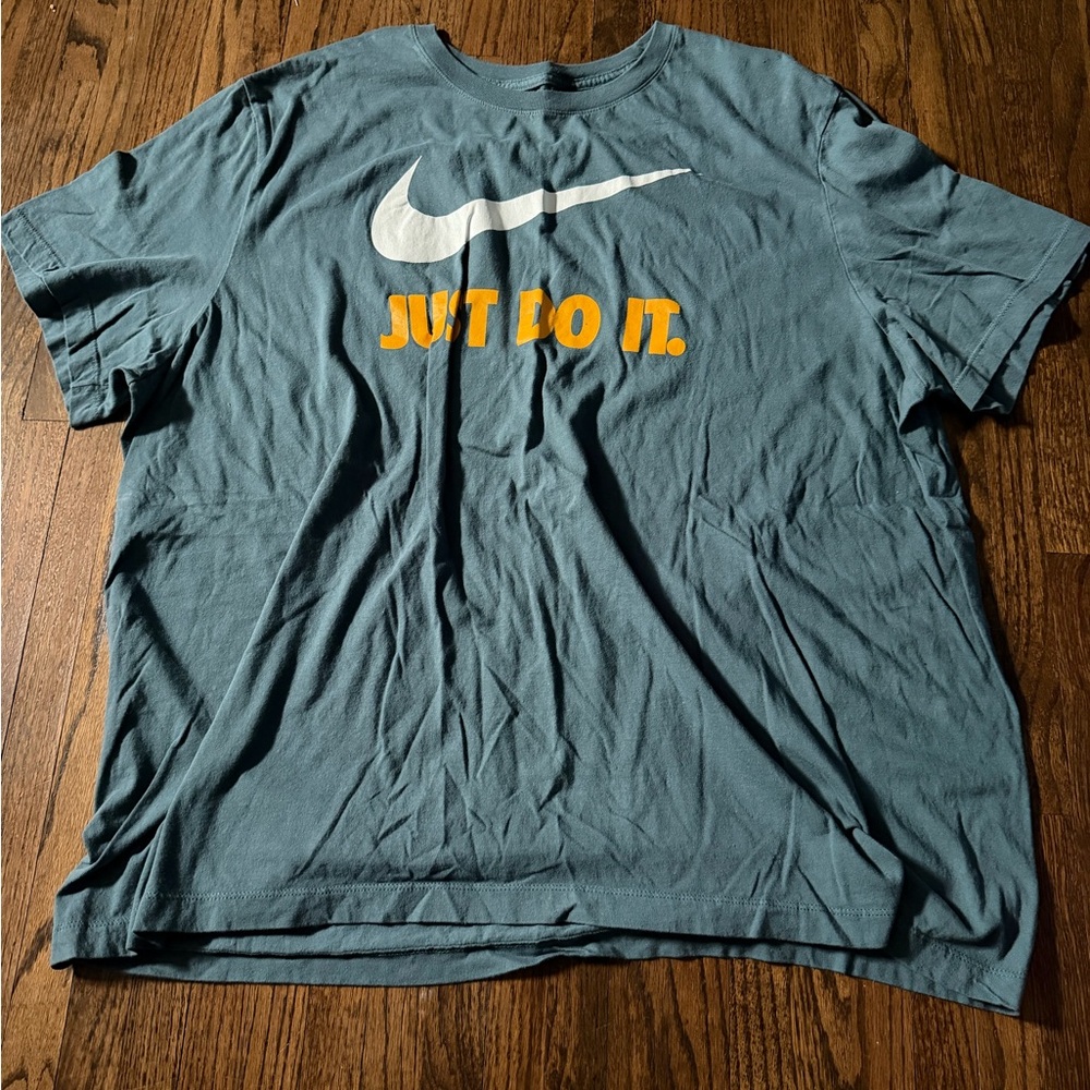 Nike Men's Teal T-Shirt with Swoosh and Slogan
